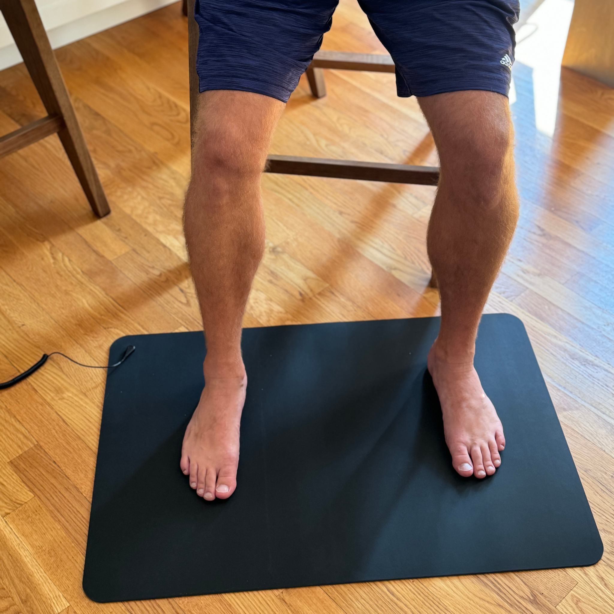 Sitting On The Earthing Floor Mat Brad.Png